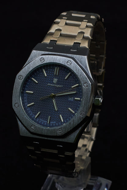 Reloj octagonal cara azul